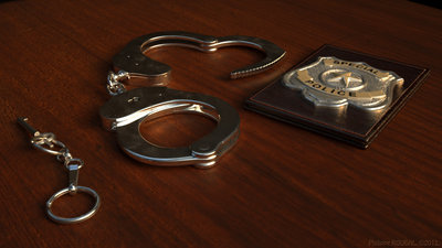 Hancuffs and police badge.